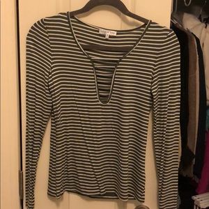 Green and white striped long sleeve top